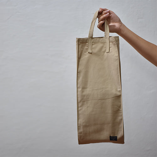 Bolsa kraft de tela confeccionada con materiales duraderos: Contribuye a cerrar el ciclo de vida sostenible